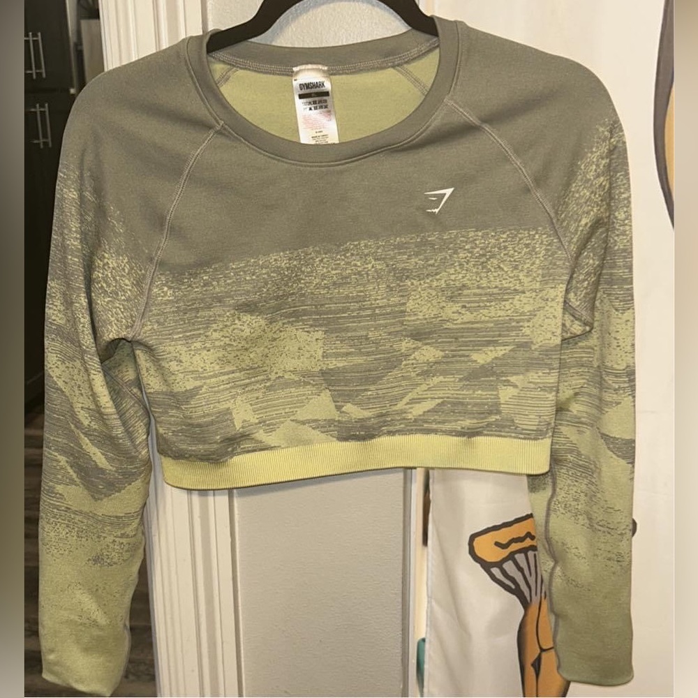 Gymshark XL can fit large. Very compressed